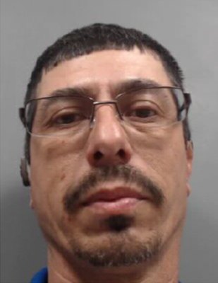 celso a man wearing glasses
