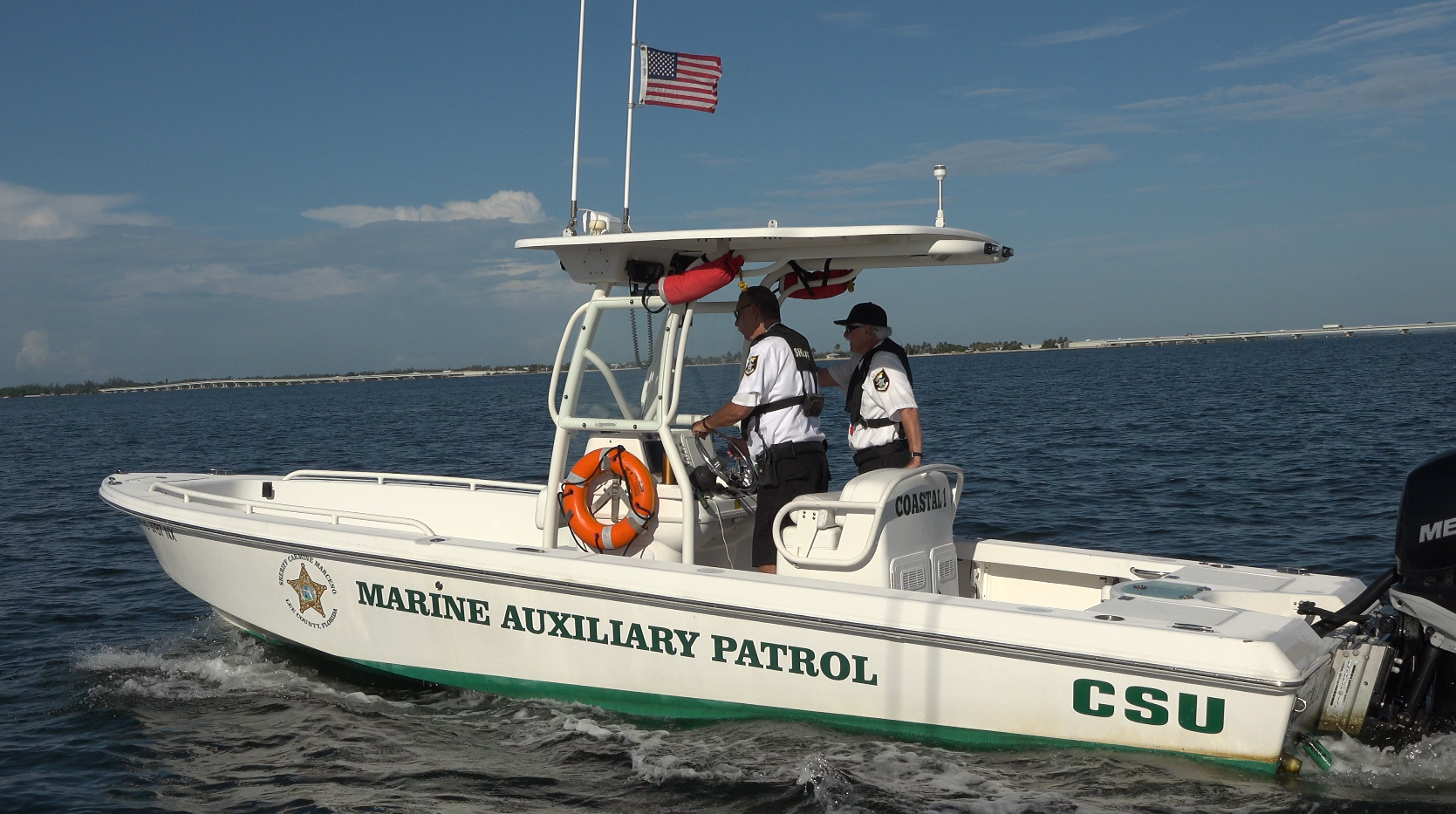 a couple of men on a boat