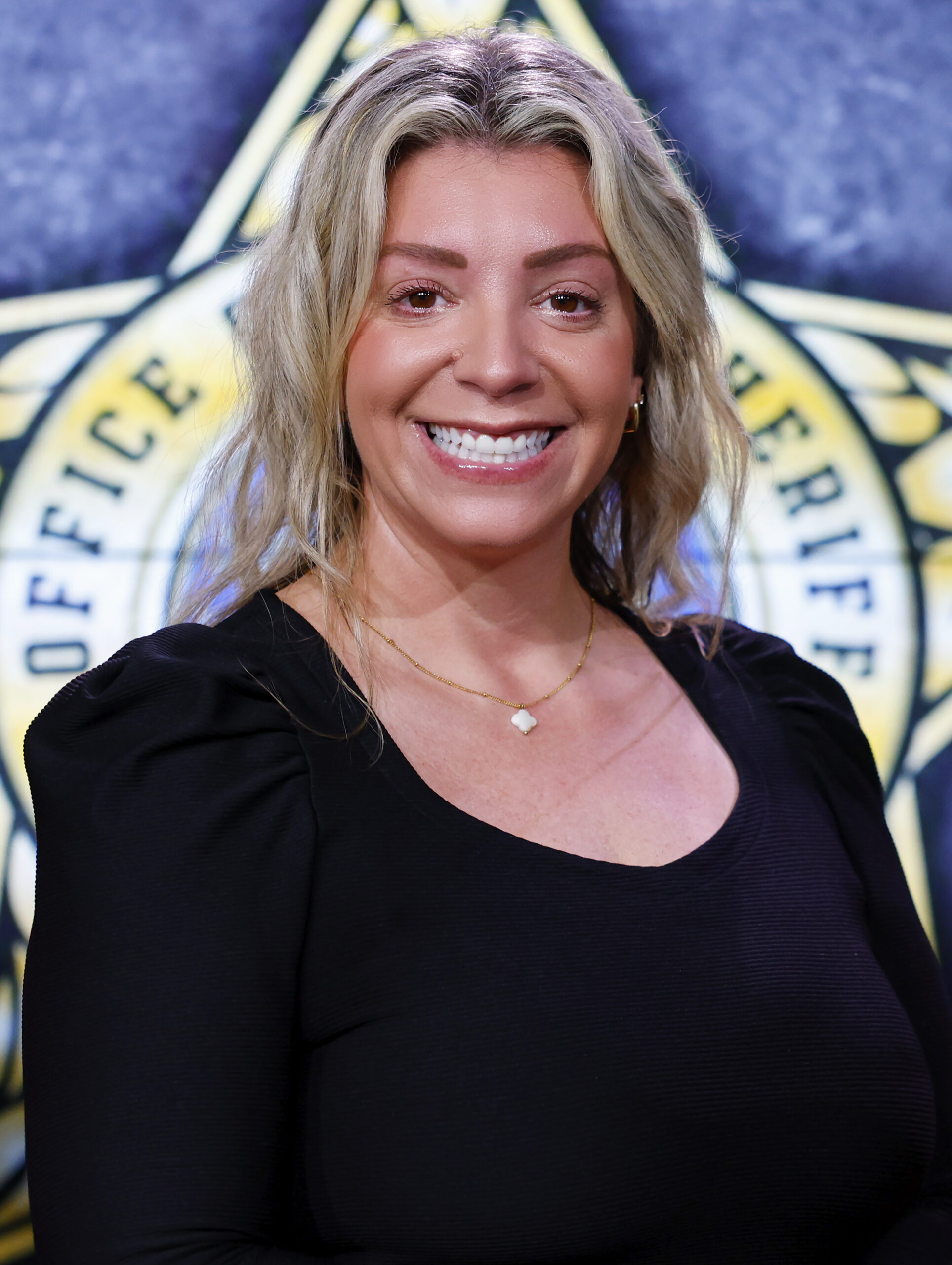 a woman smiling for the camera